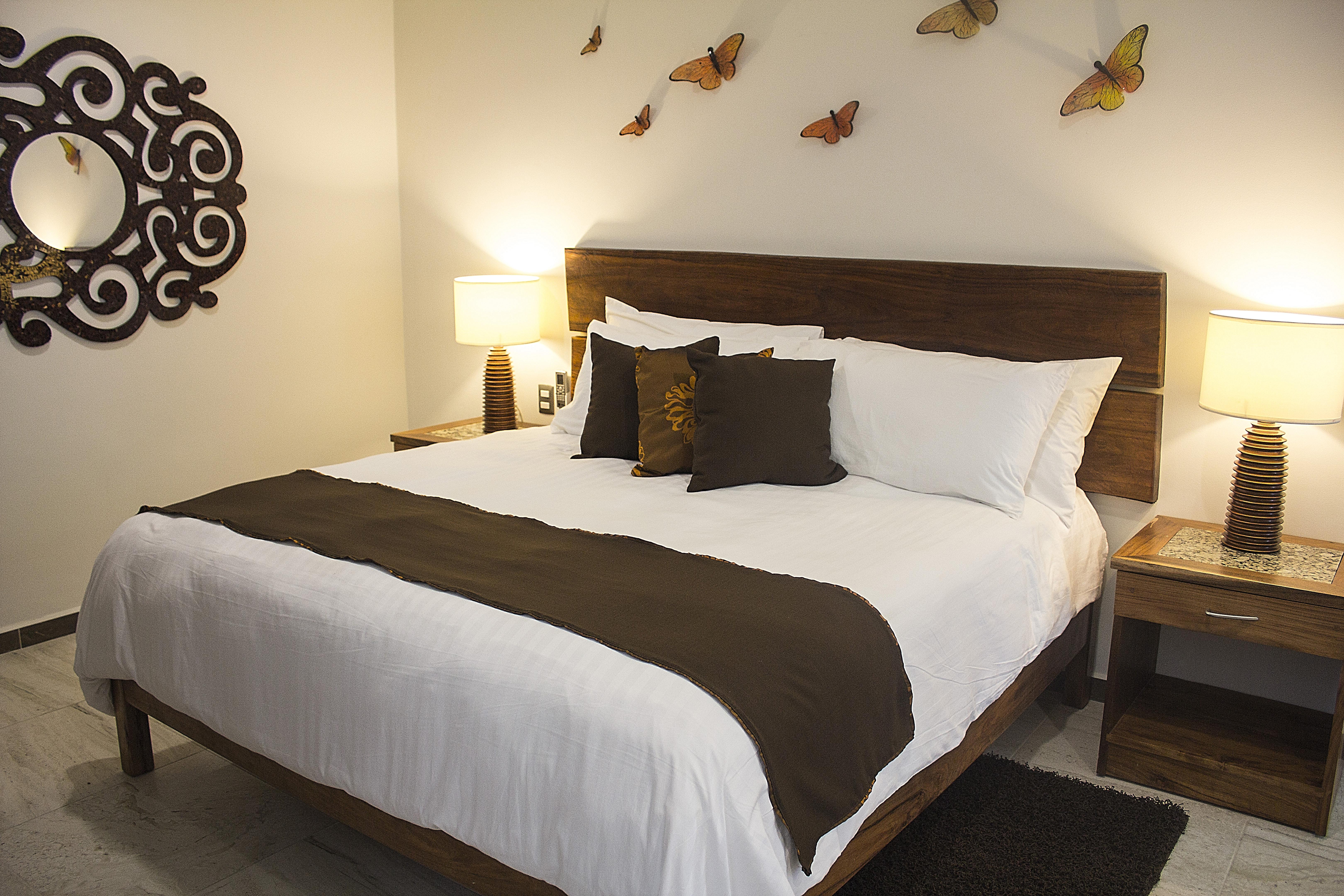Casa Ticul Hotel Boutique - 5Th Ave (Adults Only) Плайя-дель-Кармен Екстер'єр фото A bed with a bed runner