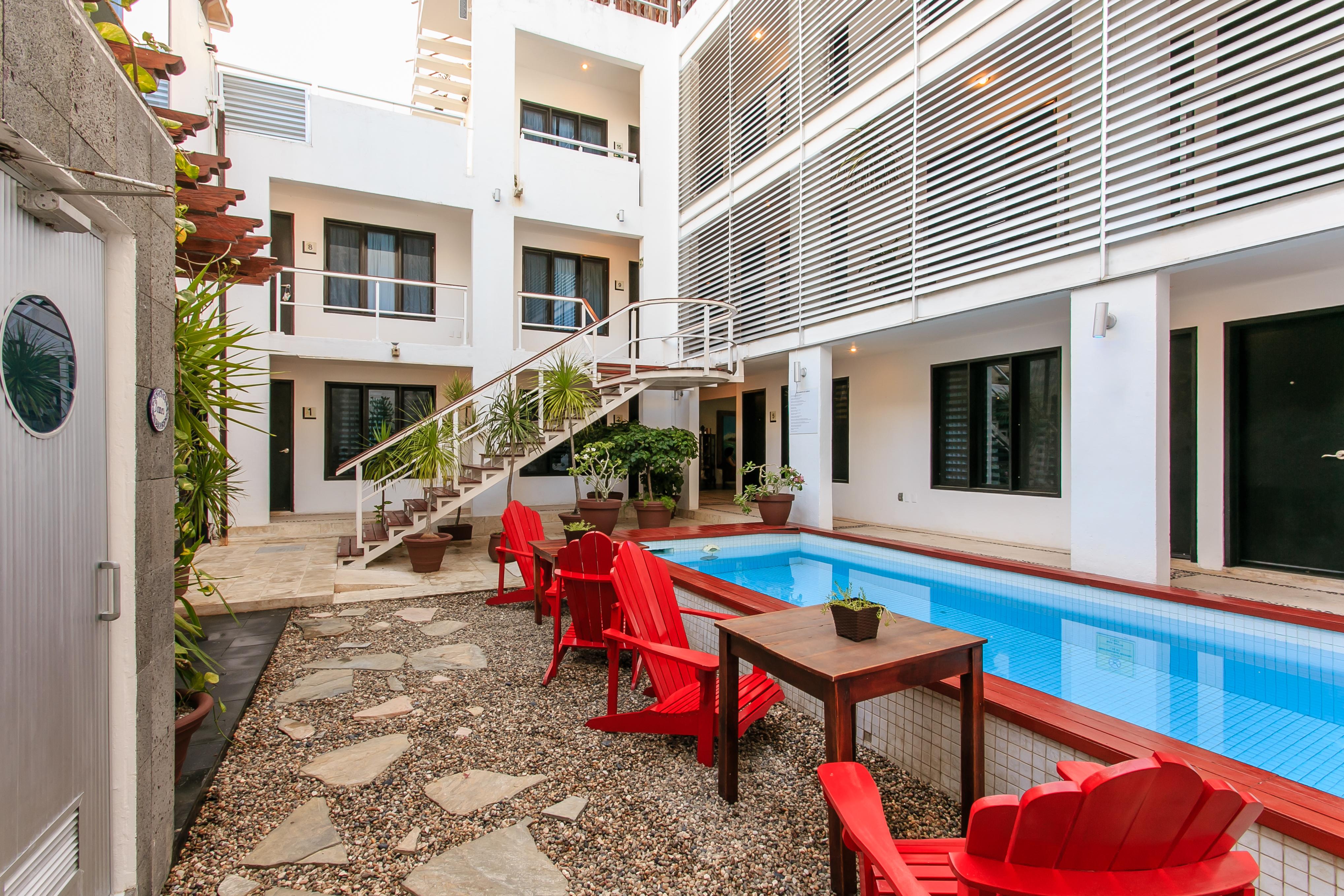 Casa Ticul Hotel Boutique - 5Th Ave (Adults Only) Плайя-дель-Кармен Екстер'єр фото The Hotel's courtyard