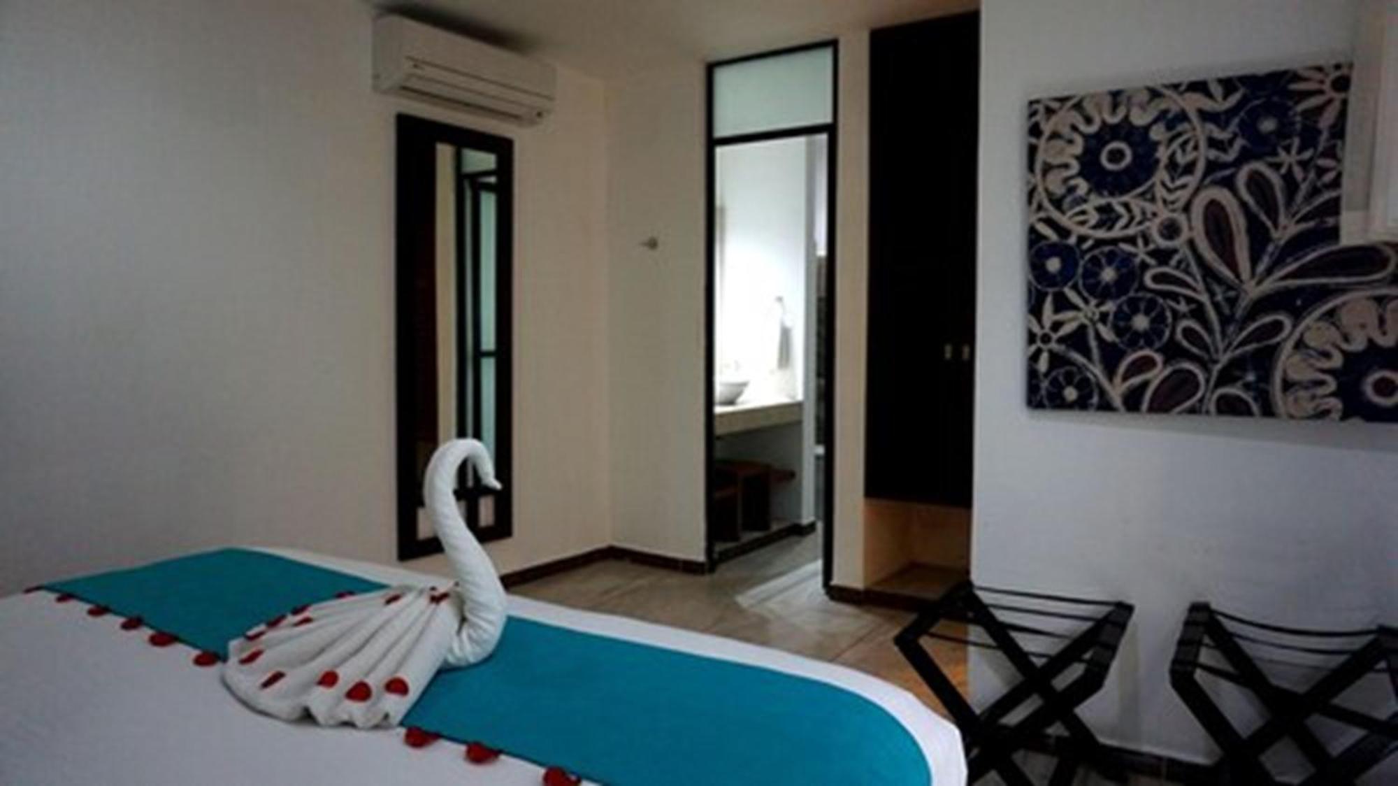 Casa Ticul Hotel Boutique - 5Th Ave (Adults Only) Плайя-дель-Кармен Екстер'єр фото A room at the hotel